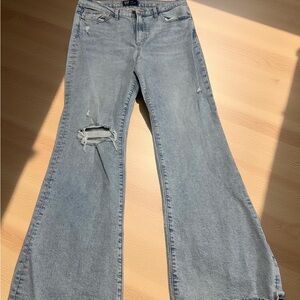 Women's Distressed Blue Jeans